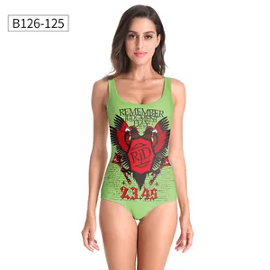 Detail of green one-piece swimsuit featuring a red eagle and shield graphic print