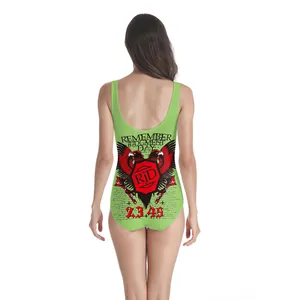 Rear view of green one-piece swimsuit featuring vintage RJD graphic and open back design