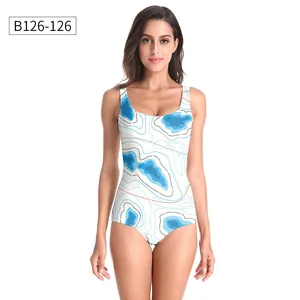 Detailed front view of a white one-piece swimsuit with blue wavy geometric patterns
