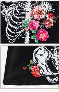 Detail of gothic tank top with rib cage print, red roses, and double-stitched hem finish