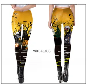 Close-up of Halloween leggings showing detailed pumpkin, bat, and castle digital prints