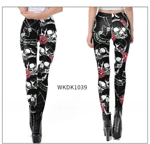 Detail of gothic skull and red rose prints on Halloween stretch leggings for women
