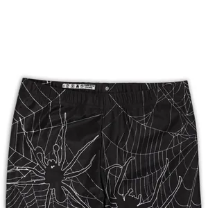 Détail de legging Halloween à motif toile d'araignée en polyester élasthanne avec étiquette