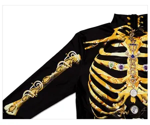 Macro detail of skeleton print with jewel embellishments on a black Halloween dress