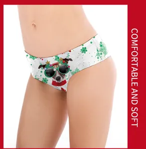 Detail of soft women's Christmas panties with cute dog digital print and red star borders