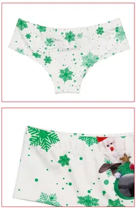 Detail of Christmas dog print underwear with snowflake patterns and festive Santa graphics