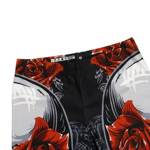 3D skull and red rose print leggings featuring a high waistband and 4-size tag details