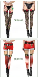 Detail view of 3D Christmas print leggings with Santa belt and lace patterns