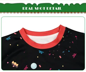 Detail of red ribbed neckline on black sweatshirt with festive 3D candy pattern print