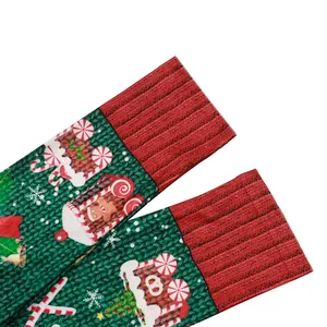 Christmas knit mid-calf socks with red cuffs featuring reindeer and gingerbread patterns