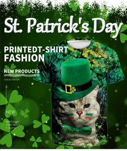 Flat lay of St. Patrick's Day t-shirt with festive cat print and shamrock background