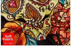 Macro shot of colorful soft fabric with heart and floral 3D prints on a jumpsuit