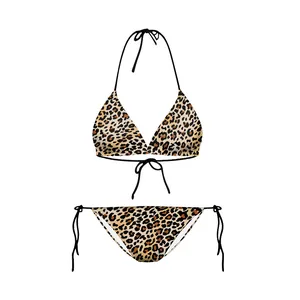 Flat lay detail of leopard print bikini set with neck tie and side-tie bikini bottoms