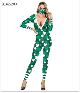 Detail of St. Patrick's Day jumpsuit with green shamrock prints and matching face mask