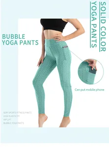 Dettaglio dei leggings yoga verde menta a nido d'ape con tasca e effetto push-up