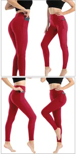 Dettaglio dei pantaloni yoga rossi a nido d'ape con vita alta e tasca laterale