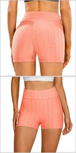 Detail of coral peach honeycomb high waist fitness shorts with scrunch butt texture