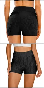 Detail view of black honeycomb texture scrunch butt yoga shorts with high waist fit
