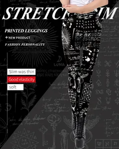 Detail view of stretch leggings featuring occult patterns and all-seeing eye prints