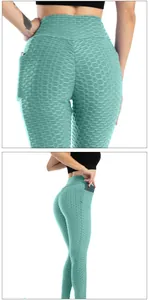 Dettaglio dei pantaloni da yoga verde menta con trama a nido d'ape e tasca laterale