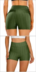 Detail showing honeycomb textured high waist yoga shorts with scrunch butt lifting effect