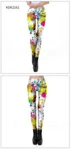Detail of colorful music note print on elastic leggings with black platform boots