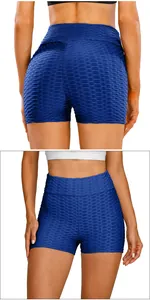 Detail view of navy blue high-waist honeycomb texture scrunch yoga shorts for women