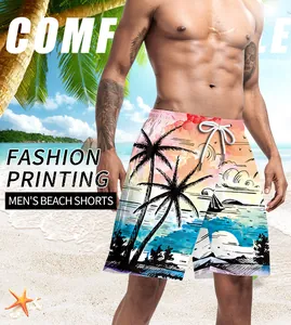 Men's beach shorts with tropical palm tree print and elastic drawstring waist on a beach