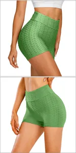 Detail view of green honeycomb yoga shorts showing butt lifting texture and compression fit