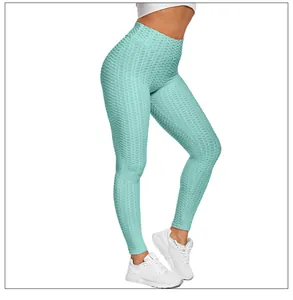 Close-up of textured honeycomb leggings in light blue with high waist yoga design