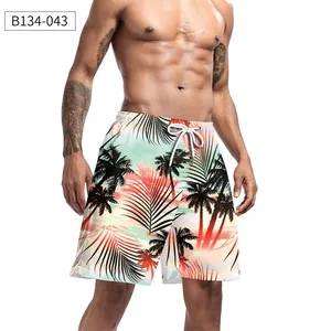 Dettaglio dei pantaloncini da uomo con stampa tropicale al tramonto e coulisse bianca