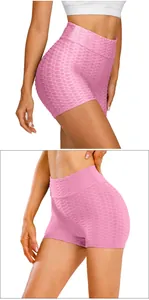 Detail shot of pink high-waisted honeycomb texture fitness yoga shorts with push-up effect