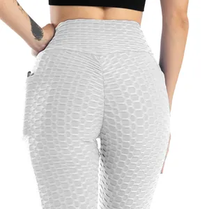 Pantaloni da yoga bianchi a vita alta con trama a nido d'ape ed effetto push-up