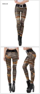 Detail of high waist leggings with 3D marble print and decorative belt with silver rivets