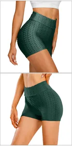 Close-up of dark green honeycomb texture on high-waist scrunch butt yoga shorts
