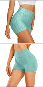 Close-up of light blue high waist yoga shorts featuring honeycomb textured fabric