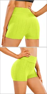 Detail of high-waisted scrunch butt yoga shorts featuring honeycomb texture fabric