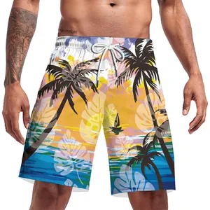 Dettaglio dei pantaloncini da mare da uomo con stampa tramonto tropicale e coulisse in vita