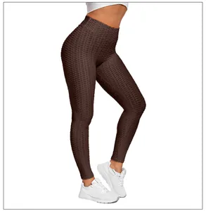 Close-up of brown honeycomb textured yoga leggings showcasing the high waist and lift effect