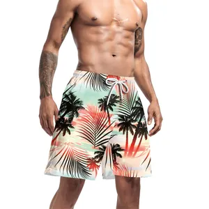 Pantaloncini da mare uomo con stampa tropicale a palma e sfumatura color tramonto
