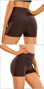Detailed view of honeycomb texture and butt-lifting seam on high-waist yoga shorts