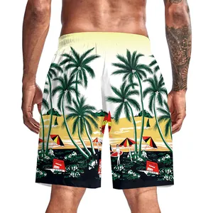 Detailed back view of men's beach shorts with tropical palm trees and windsurf prints