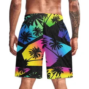 Rear view of men's quick-dry beach shorts with tropical palm trees and vibrant gradient colors