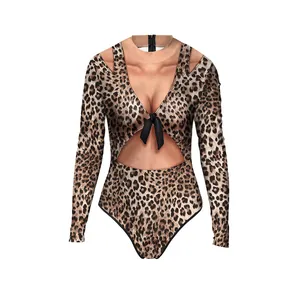 Detail of leopard print long sleeve swimsuit with cutout waist and front knot decor