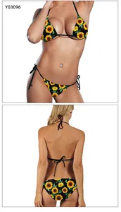 Front and back view of sunflower print halter bikini set with side tie bottoms