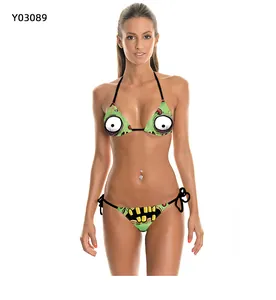 Detail of green bikini set with monster face print and side-tie triangle bottoms