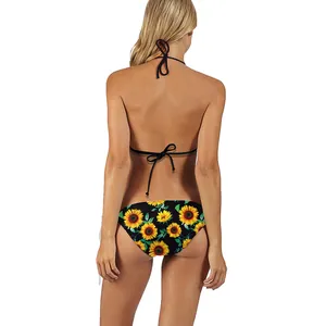 Back view of black bikini set with bright yellow sunflower print on classic swimsuit bottom