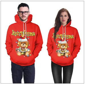 Detail of red Christmas hoodies with digital bear print and Merry Christmas text