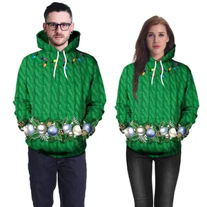 Couple wearing green 3D digital Christmas hoodies with printed light bulbs and ornaments
