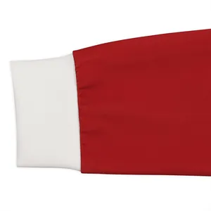 Red Christmas sweatshirt sleeve detail showing premium white ribbed cuffs and precise stitching